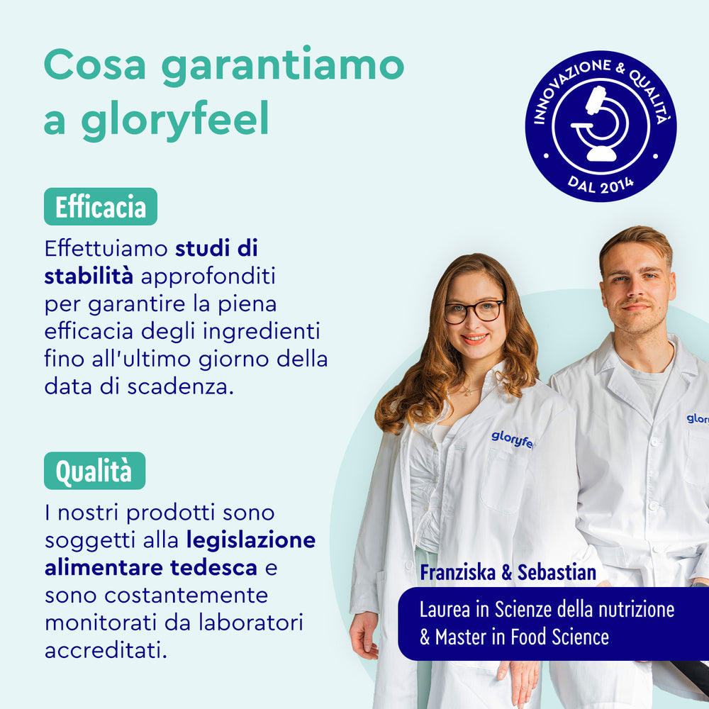 Due persone in camice da laboratorio stanno davanti a un poster promozionale e discutono dell&